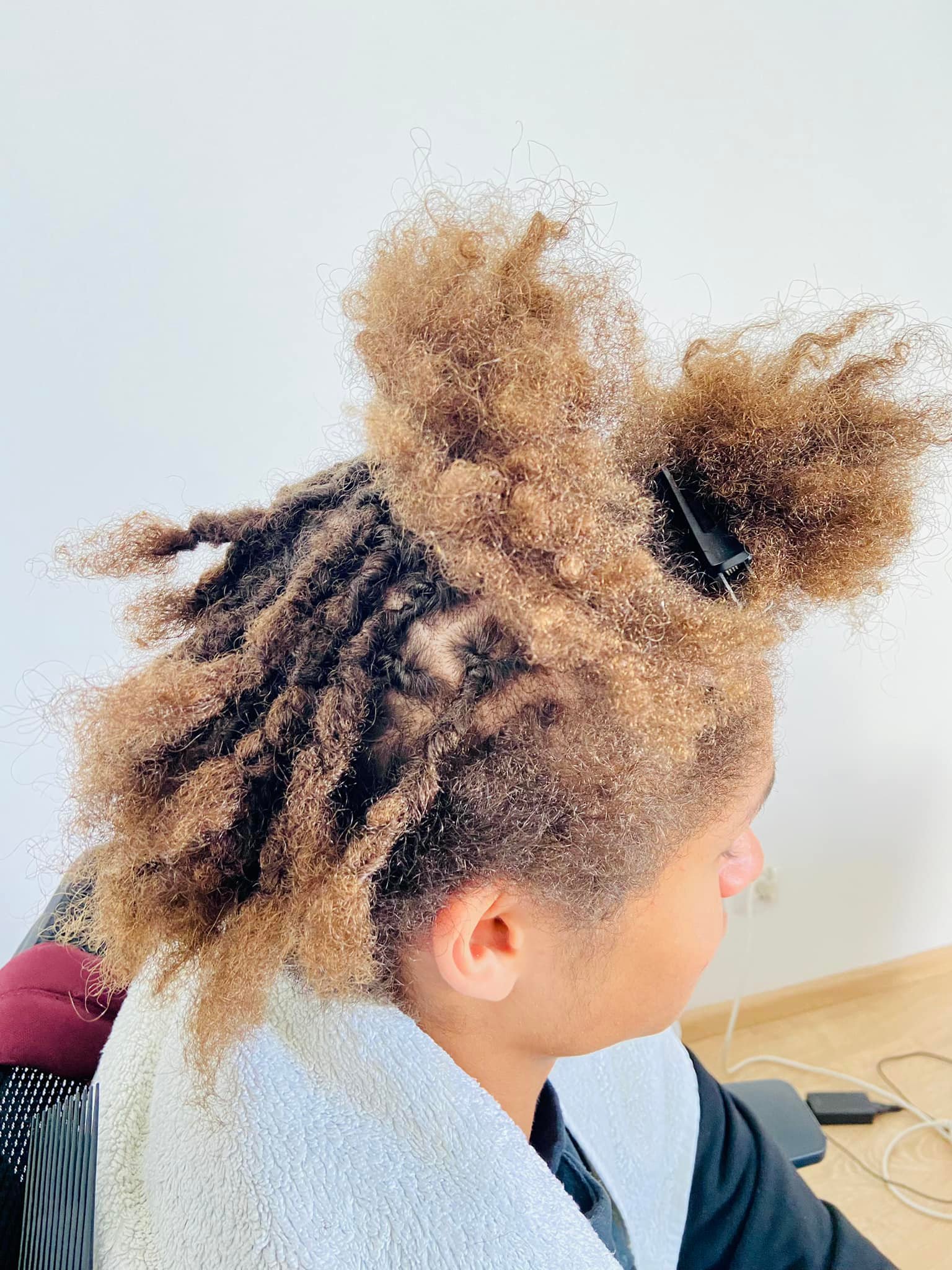 Man with intricate locs